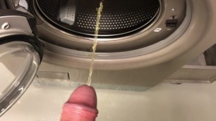 Pissing much into the Public Washing Machine. Strong Yellow Urine
