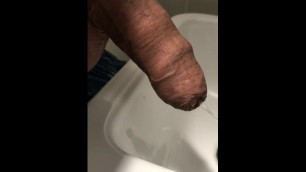 Uncut Cock getting Harder while Pissing