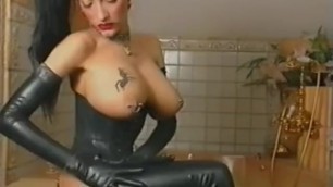 Brunette Shining her Black Latex