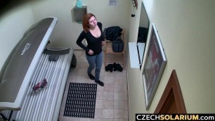 Redhead Hottie Tannning in Public Solarium