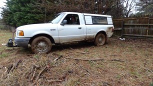 Stuck in mud by the fence
