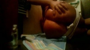 Rubbing oil on my ass and cumming
