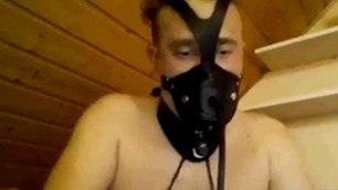Slut in lingerie with nipple clamps, penis gag face harness