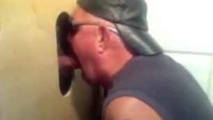 A glory hole suck given to a married man