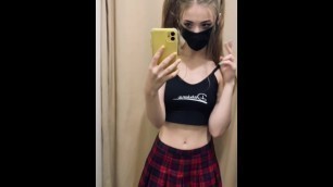 An Excited Schoolgirl in the Fitting Room Showed her Ass